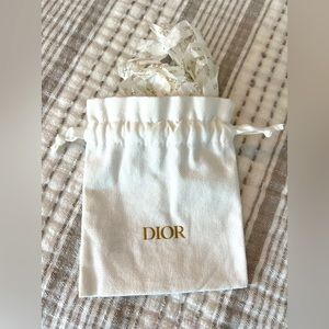 DIOR small canvas drawstring bag with DIOR tissue approx 5”x6”